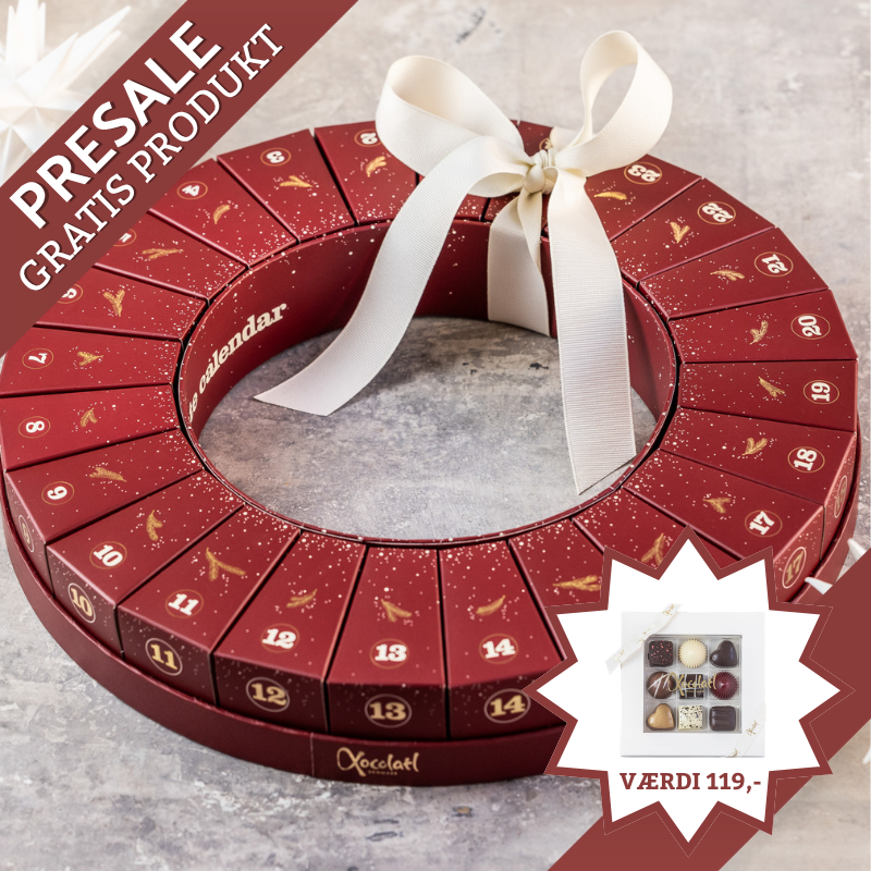 Julekalender fra Xocolatl – 24 æsker samlet i en smuk krans, hver med to fyldte danske chokolader med bl.a. karamel, ganache og nougat.	