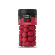 En bøtte Lakrids by Bülow Strawberries and Cream med røde chokoladeovertrukne lakridskugler.