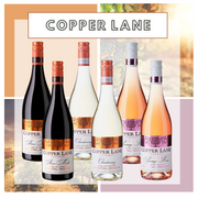 Vinsmagekasse med seks forskellige flasker rødvin, hvidvin og rosé fra Copper Lane vinhuset.