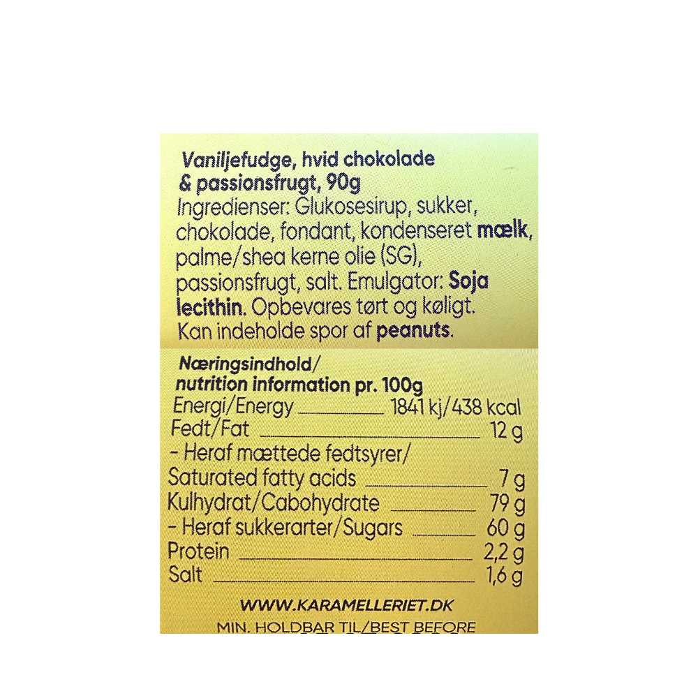 Karamelleriet Solstrejf vaniljefudge med hvid chokolade og passionsfrugt i gul indpakning.