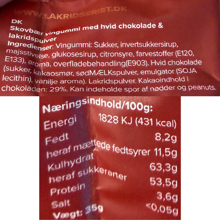 Ingrediensliste og næringsindhold for skovbær vingummi med hvid chokolade og lakridspulver fra Lakridseriet.