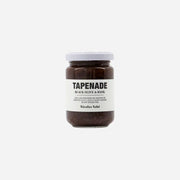 Et glas sort oliventapenade med basilikum fra Nicolas Vahé hos Delikatessehuset.