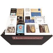Økologisk gavekurv fra Delikatessehuset med chokolade, nødder og øl til En Kærlig Tanke.