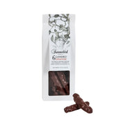 Hvid pose med Summerbird økologisk kandiseret appelsin overtrukket med mørk chokolade.