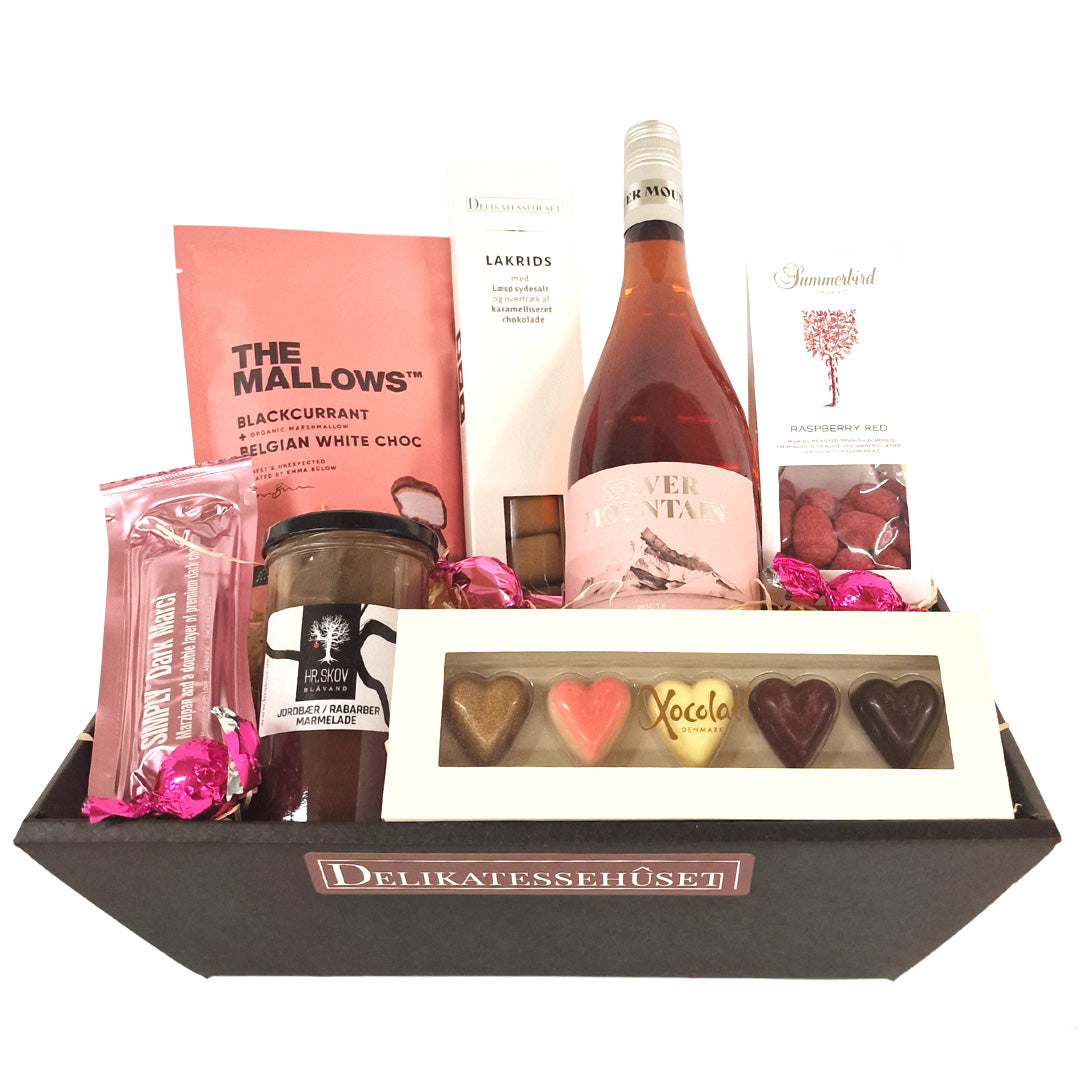 Stor eksklusiv gavekurv med vin, chokolade fra Summerbird, lakrids og delikatesser fra Delikatessehuset.