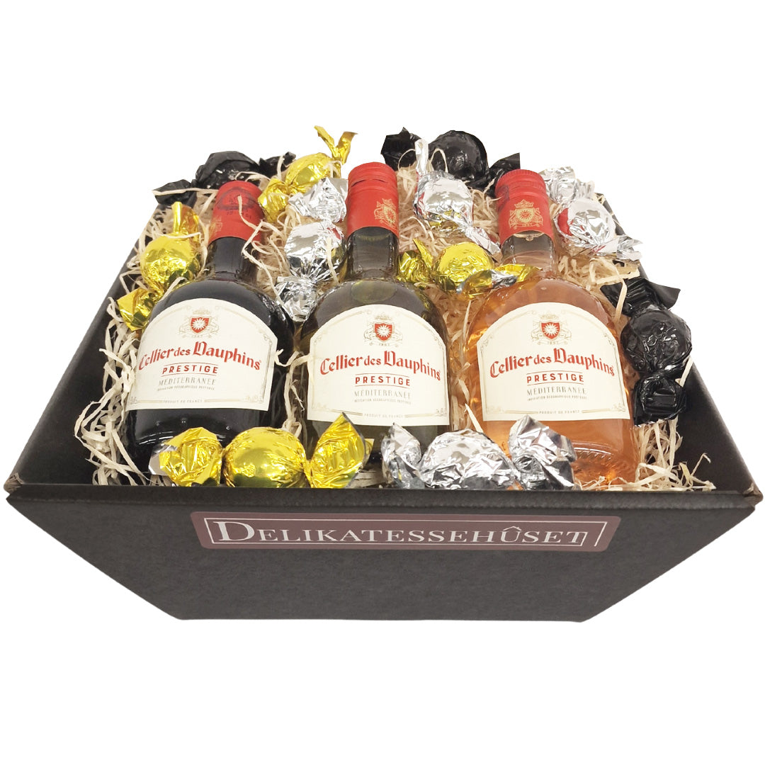 Gavekurv med rødvin, hvidvin, rosévin og chokolade fra Cellier des Dauphins hos Delikatessehuset.