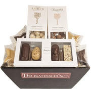 Lille gavekurv fra Delikatessehuset fyldt med eksklusivt Summerbird Organic chokolade og petit fours.