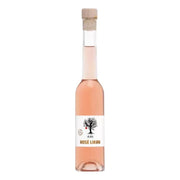 Flaske med Hr. Skov Rosé Likør, en delikat likør perfekt til cocktails med tonic.