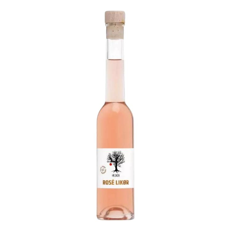 Flaske med Hr. Skov Rosé Likør, en delikat likør perfekt til cocktails med tonic.